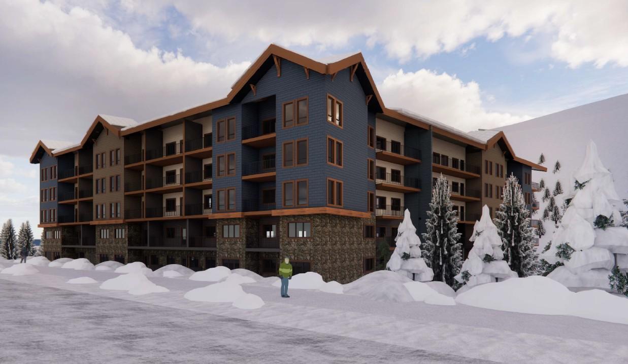 Corner view of a six-story lodge with balconies, roof with peaked accents, stone base and snowy surroundings.